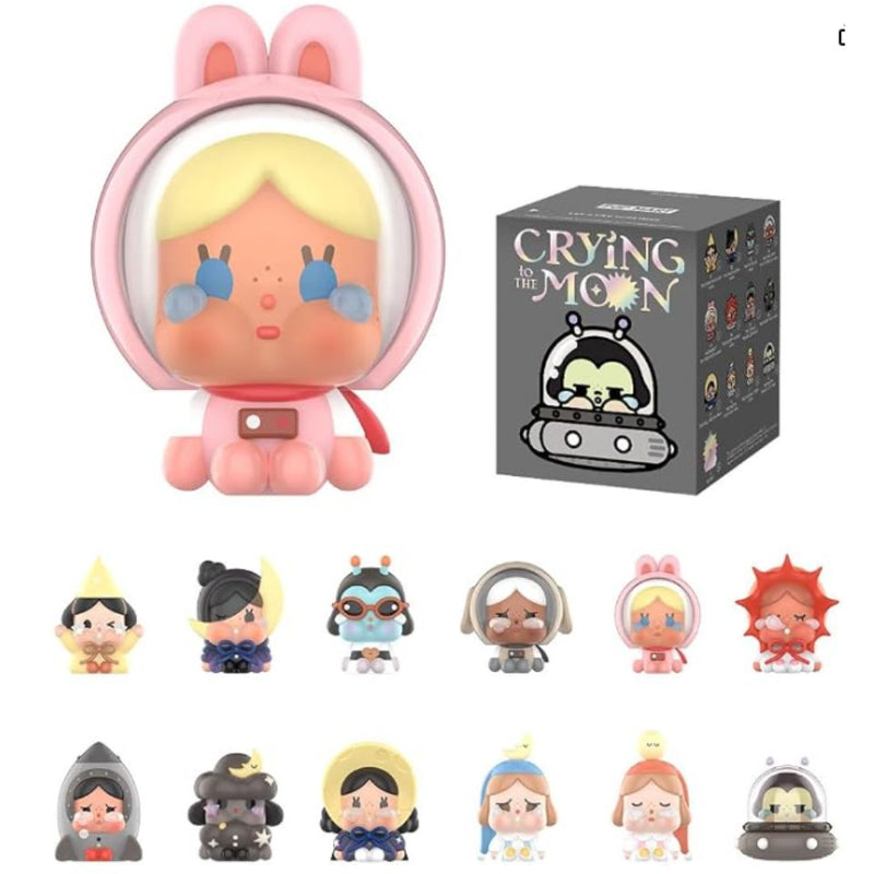 POP MART CRYBABY Crying to the Moon Sitting Series Blind Box showing pink bunny-eared CRYBABY figure and collectible series lineup